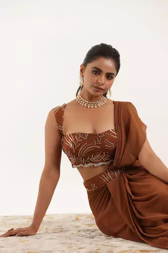 pre-stitched brown pre drpaed saree