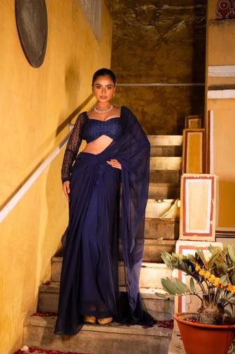 Embroidered pre draped navy blue saree