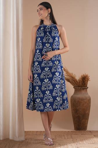 Gathered halter neck dress in a bold ikat print on cotton.
