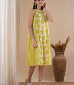 A printed dress with centre placket and pleated side panels with 2 pockets.