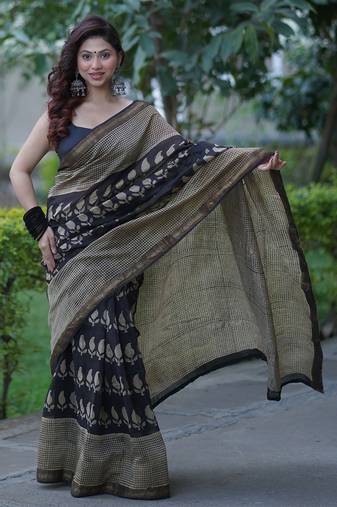 Black maheshwari silk blend saree with buti and checks on bottom and pallu
