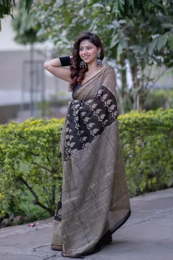 Black maheshwari silk blend saree with buti and checks on bottom and pallu