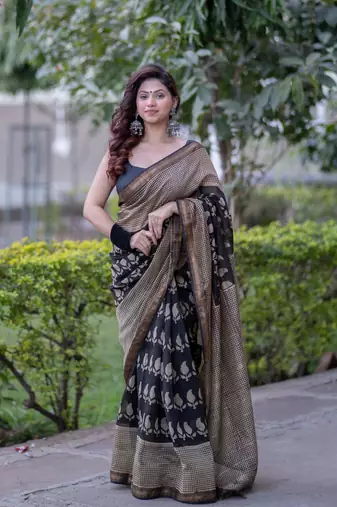 Black maheshwari silk blend saree with buti and checks on bottom and pallu