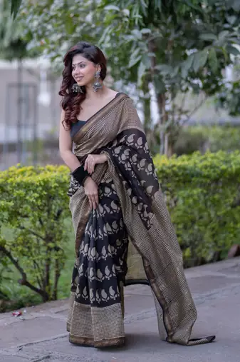 Black maheshwari silk blend saree with buti and checks on bottom and pallu