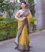 Yellow maheshwari silk blend saree with buti and checks on bottom and pallu