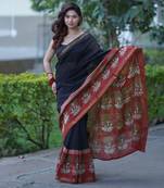 Black maheshwari silk blend saree with red border and pallu