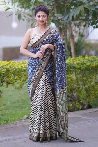 Off white zig zag maheshwari silk blend saree with blue pallu