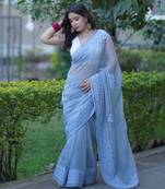 Light blue kota doria saree with same applique work