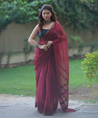 Maroon kota doria saree with ajrakh border and zig zag on pallu 1