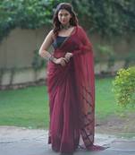 Maroon kota doria saree with ajrakh border and zig zag on pallu