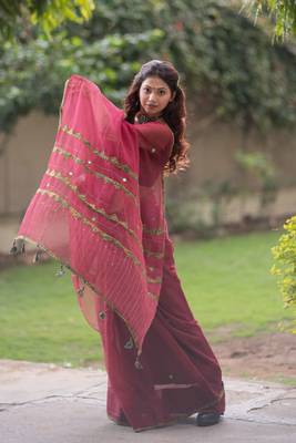 Maroon kota doria saree with ajrakh border and zig zag on pallu 2