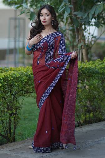 Maroon kota doria saree with blue ajrakh applique border and work on pallu