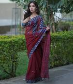 Maroon kota doria saree with blue ajrakh applique border and work on pallu