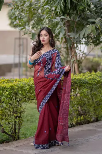 Maroon kota doria saree with blue ajrakh applique border and work on pallu