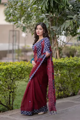 Maroon kota doria saree with blue ajrakh applique border and work on pallu