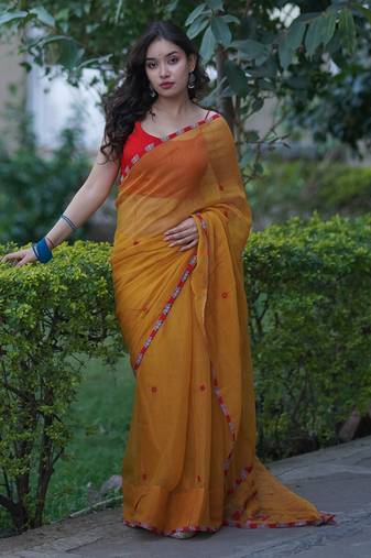 Yellow kota doria applique saree with red ajrakh border and work on pallu