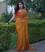 Yellow kota doria applique saree with red ajrakh border and work on pallu