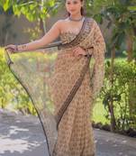 Cream kota doria saree with elephant block print