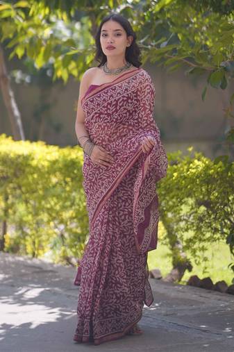 Maroon kota doria sarees with white leafy all over print