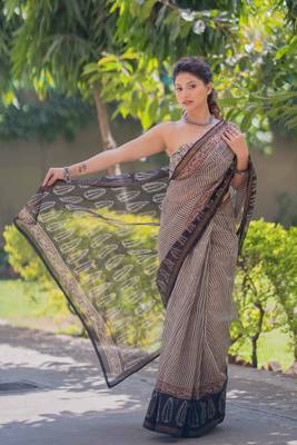 Cream kota doria saree with black stripes, black border and pallu 4