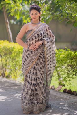 Cream kota doria saree with black buti print 1