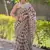 Cream kota doria saree with black buti print
