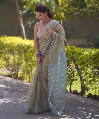 Light yellow kota doria sarees with floral prints , blue border and pallu 1