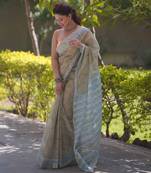 Light yellow kota doria sarees with floral prints , blue border and pallu