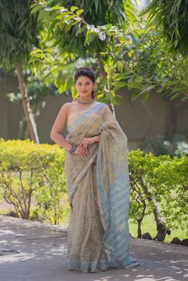 Light yellow kota doria sarees with floral prints , blue border and pallu 2