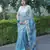 Light blue floral print kota doria saree with stripes on pallu