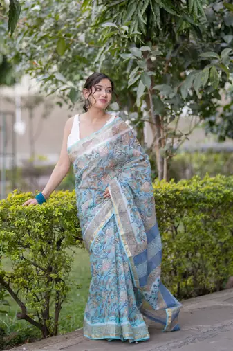 Light blue floral print kota doria saree with stripes on pallu
