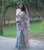 Blue kota doria saree with red and cream floral print