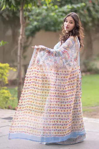 Blue kota doria saree with red and cream floral print