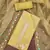yellow roman cotton silk embroidered unstitched dress material