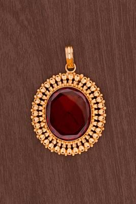  garnet pendant one gram gold 1