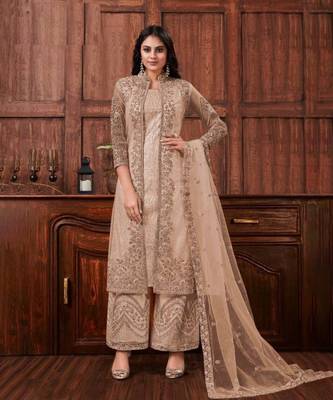 Beige net heavy embroidery semi stitched wedding suit 1