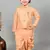 Boys jacquard ethnic motifs kurta dhoti pant with waistcoat set - peach