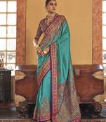 Turquoise silk blend saree with print work for ceremonial