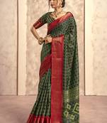 Dark green silk blend foil print  saree