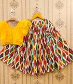 Vibrant ikat print lehenga set with ruffle blouse