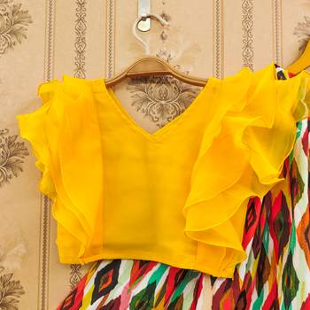 Vibrant ikat print lehenga set with ruffle blouse 2