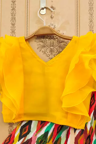 Vibrant ikat print lehenga set with ruffle blouse