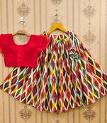 Vibrant ikat print lehenga set with ruffle blouse