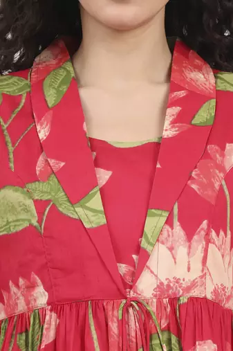 Divena green floral printed cotton lepal neck peplum top
