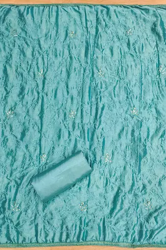 turquoise premium cotton embroidered work unstitched dress material