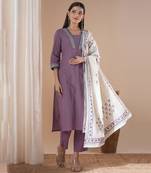 A 3-piece block printed kurta suit set with lace detail and block printed dupatta.
