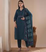 Blue dobby kurta set  featuring highlights  of  contrasting colour  embroidery &  self bottom.