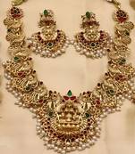 Traditional lakshmi temple necklace set – gold-plated bridal jewelry with pearls & kemp stones
