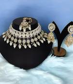 Elegant pearl choker necklace set with maang tikka and jhumka earrings - traditional indian bridal jewelry collection