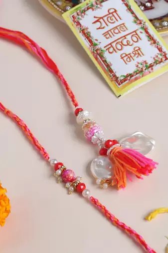 set of 2 multicolor artificial stones & beads bhaiya bhabhi rakhi with roli chawal chandan & mishri